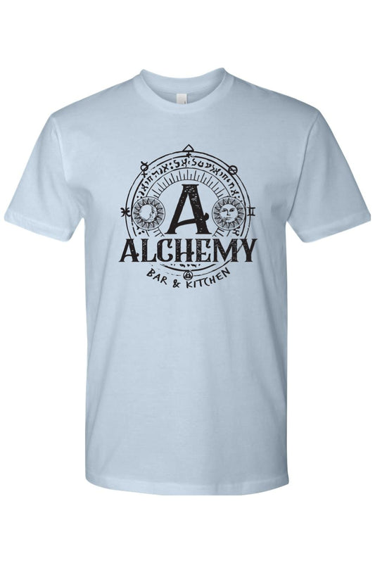 Light blue crew neck t-shirt featuring a black Alchemy Bar & Kitchen circular logo with sun and moon celestial graphics.