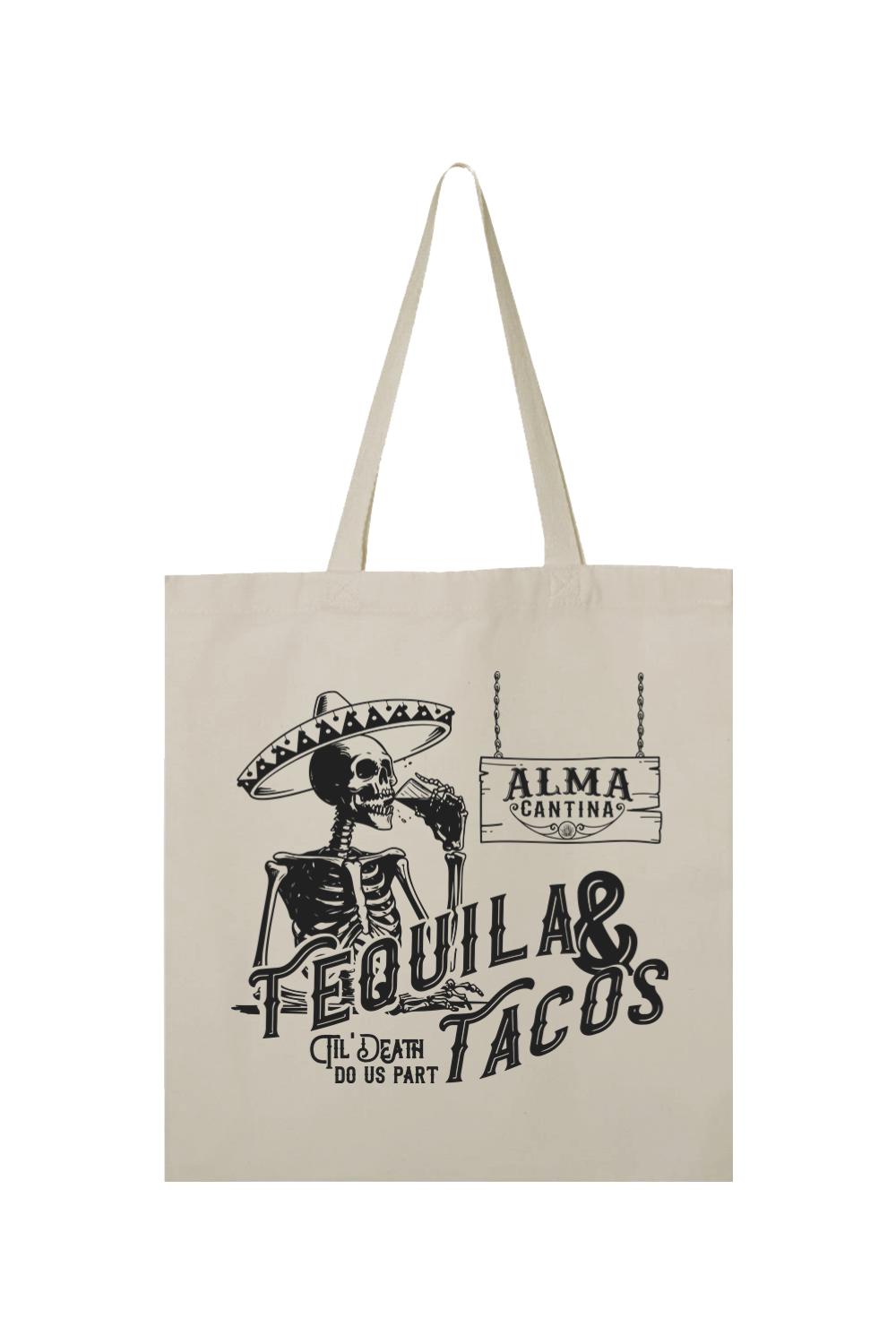 Natural canvas tote bag featuring a black skeleton graphic, sombrero, and Alma Cantina Tequila & Tacos text design.