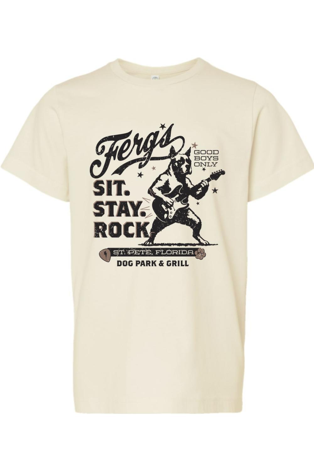 Cream-colored kid's cotton t-shirt featuring a black graphic of a dog playing guitar with Ferg's Rockin Pup text.