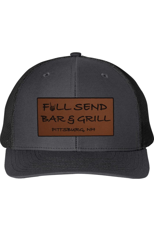 Charcoal grey trucker cap with a brown rectangular patch featuring the Full Send Bar & Grill Pittsburg, NH logo.