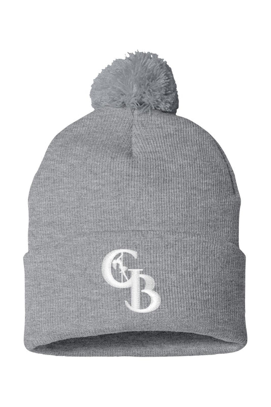 Grey knit beanie with a pom-pom top and white embroidered GB logo on the folded cuff.
