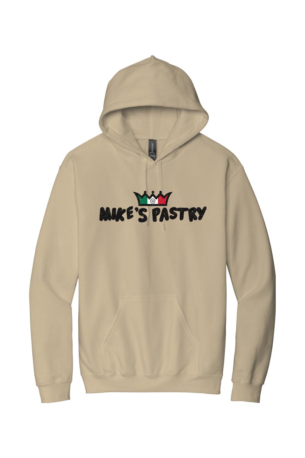 Tan unisex hoodie featuring the Mike's Pastry logo with an Italian flag crown graphic on the chest and a front pouch pocket.