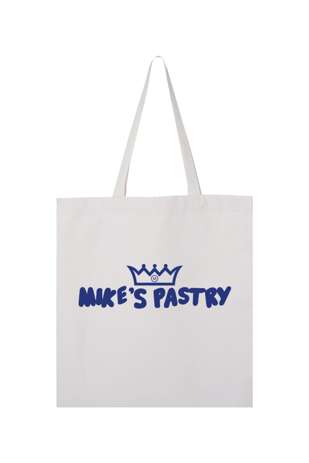 White canvas tote bag featuring a blue Mike's Pastry logo with a crown icon and bold lettering.