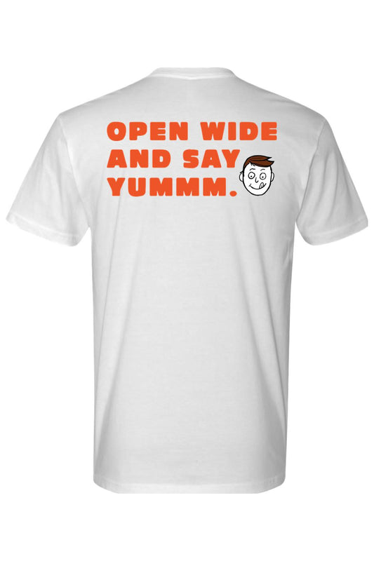 White cotton crew neck t-shirt featuring orange text reading Open Wide and Say Yummm with a cartoon face graphic.