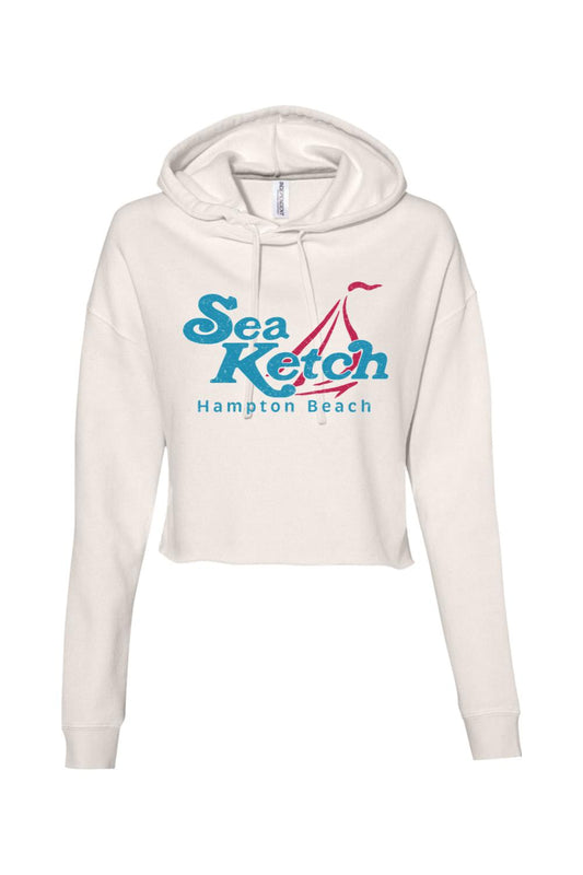 Lightweight cream cropped hoodie featuring a blue and red Sea Ketch Hampton Beach sailboat graphic.