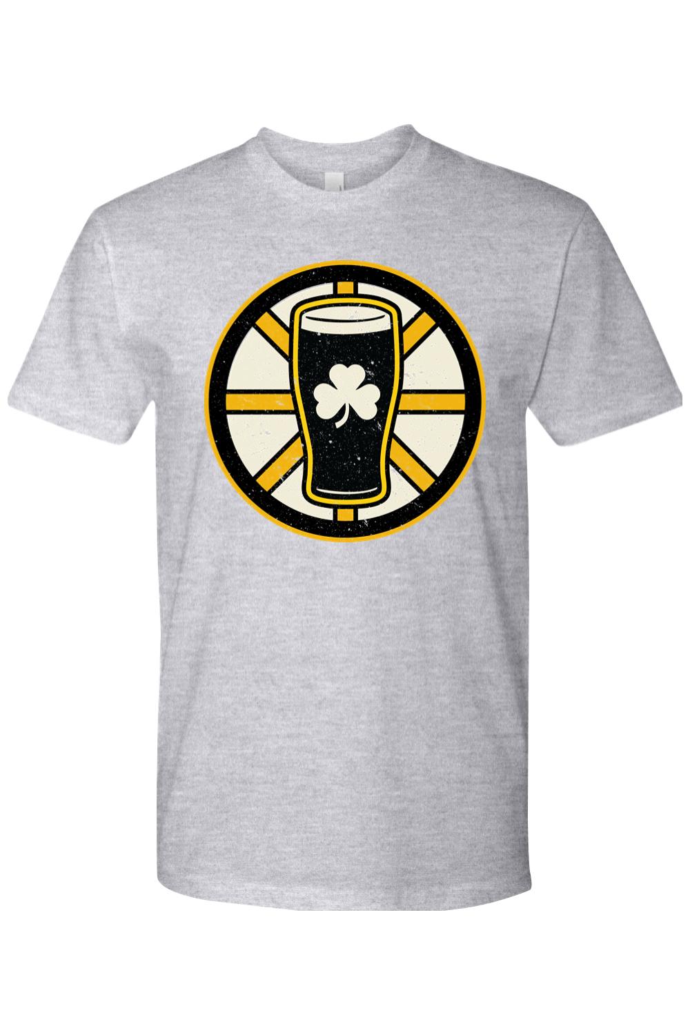 Grey cotton t-shirt featuring a black and gold hockey-inspired graphic of a pint glass with a white shamrock.