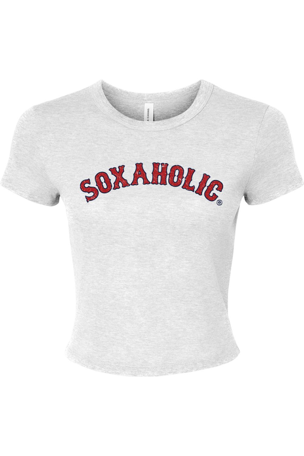 Light grey ribbed baby tee featuring Soxaholic in distressed red and blue varsity-style lettering.