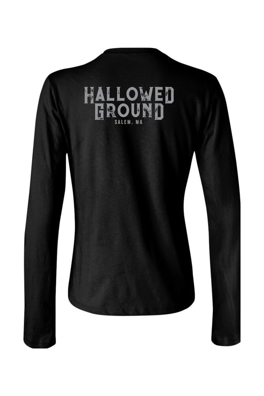 Black women's long sleeve cotton t-shirt featuring Hallowed Ground Salem, MA text on the back.