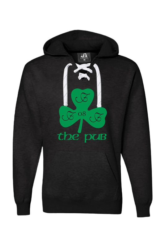 Black hooded sweatshirt with white lace-up neckline, featuring a green shamrock logo and The Pub text graphic.