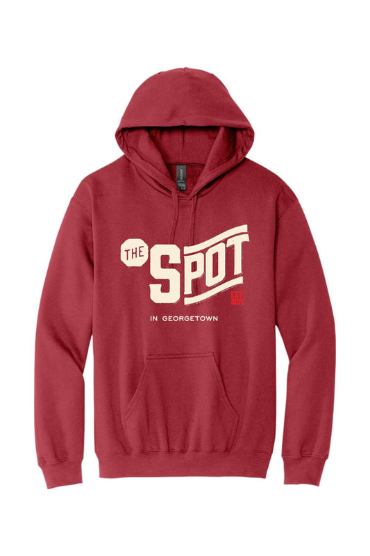 Maroon pullover hoodie with a white The Spot Georgetown graphic, featuring a front kangaroo pocket and hood.
