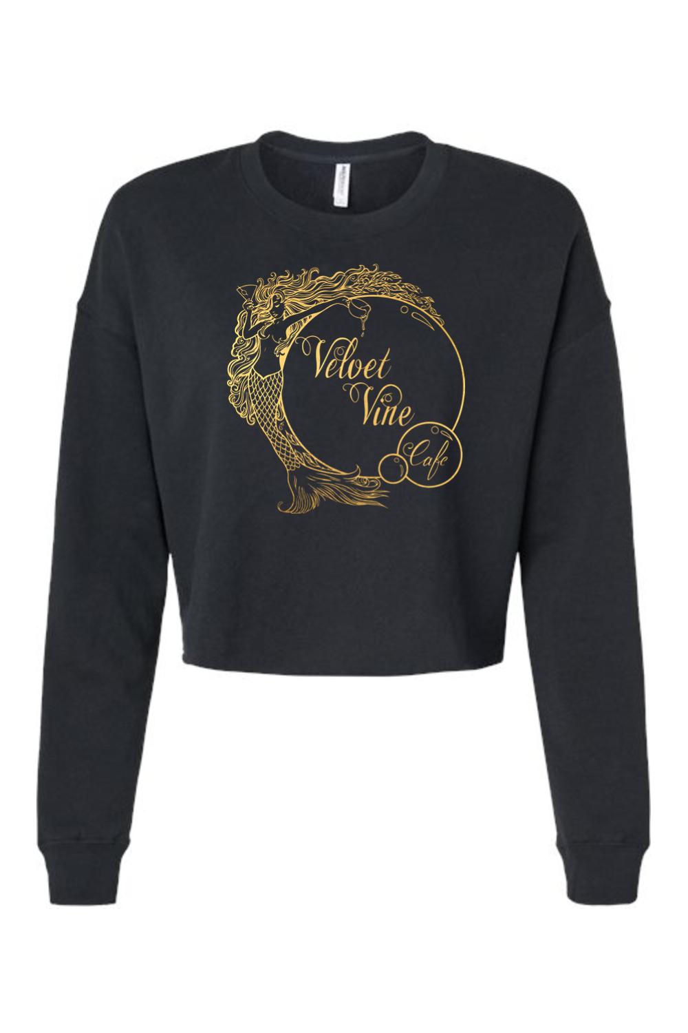 Black cropped sweatshirt featuring a gold Velvet Vine Cafe mermaid logo on the front with long sleeves.
