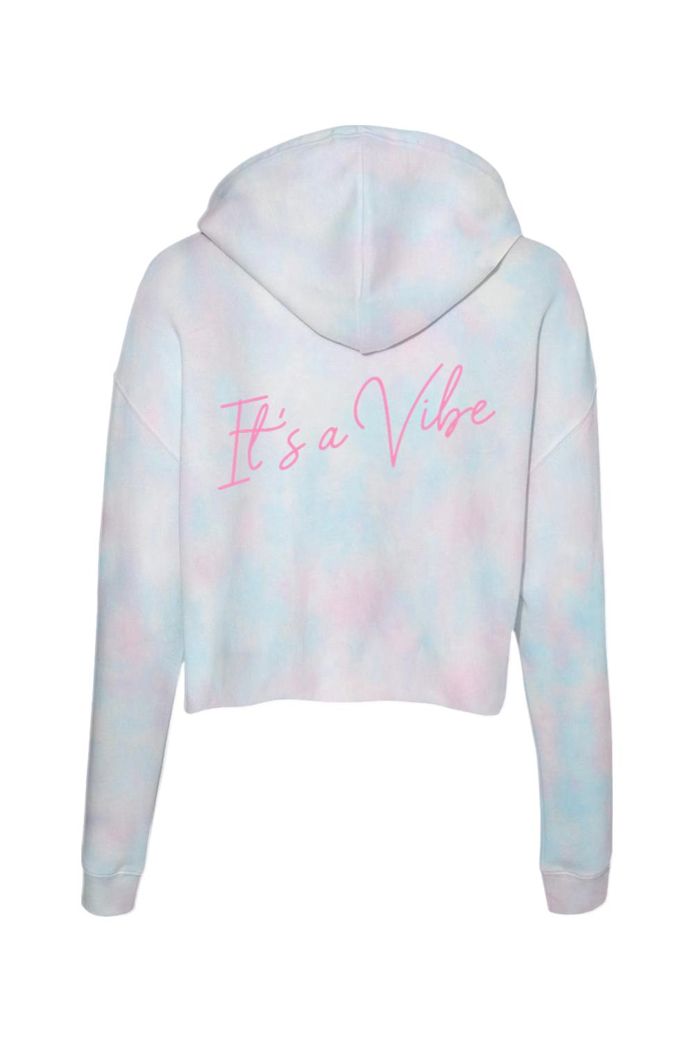 Pink and blue tie-dye cropped hoodie featuring the phrase It's a Vibe in pink script on the back.