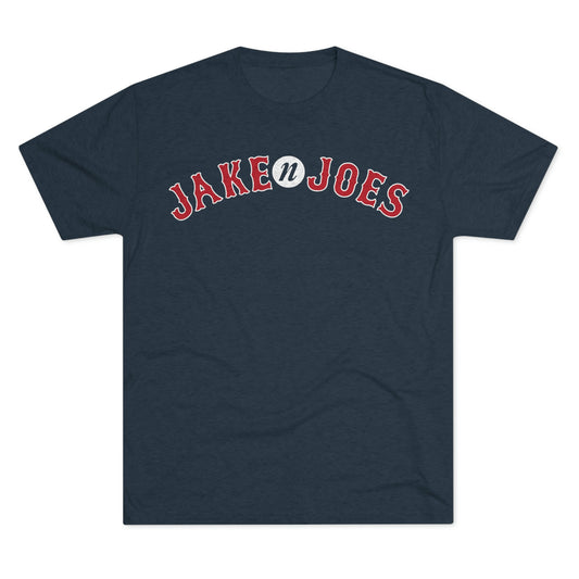 Navy blue tri-blend t-shirt featuring a red and white arched Jake n JOES baseball-style logo on the chest.