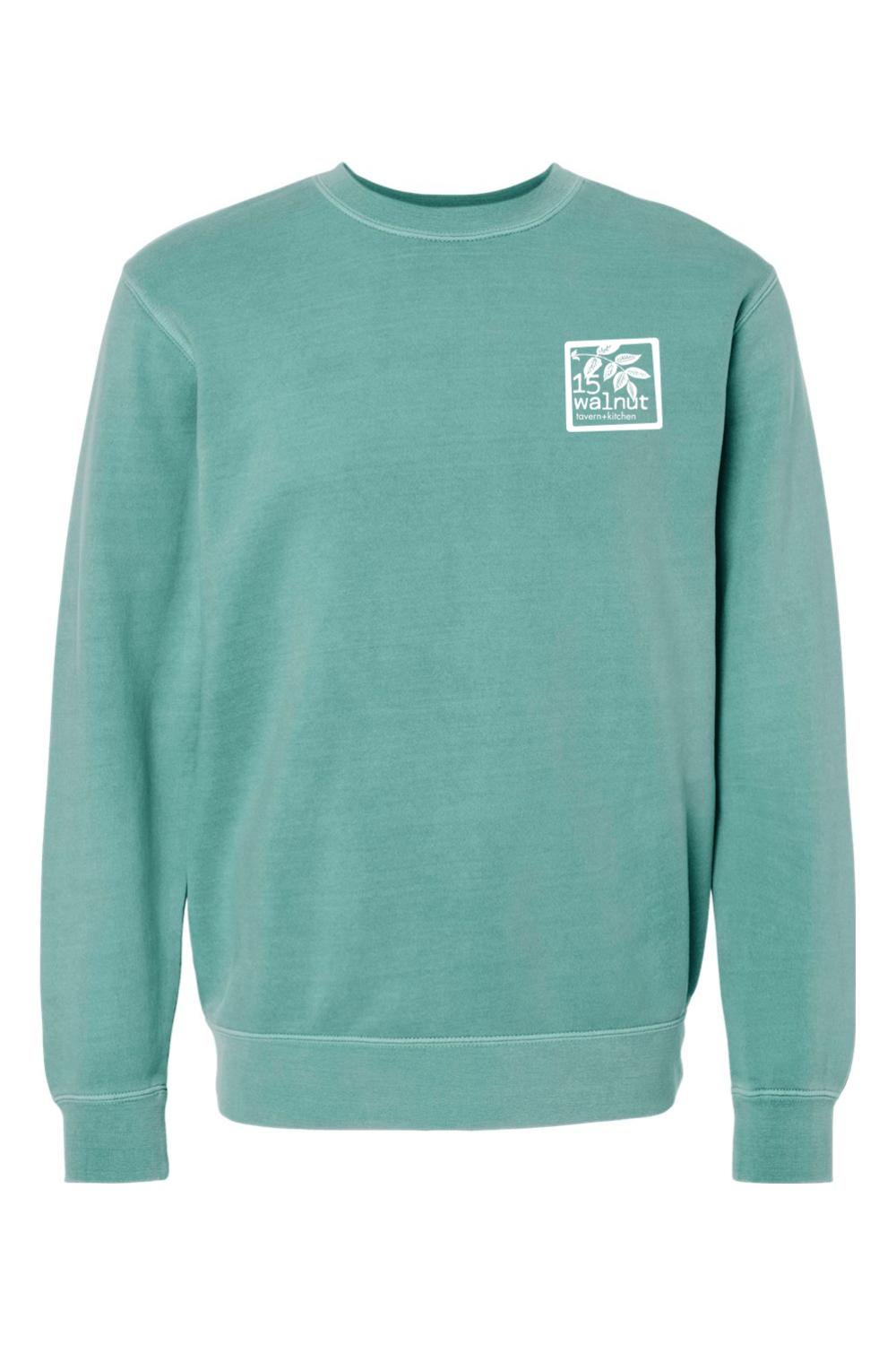 Pigment-dyed teal crewneck sweatshirt with a white 15 Walnut Tavern + Kitchen chest logo.