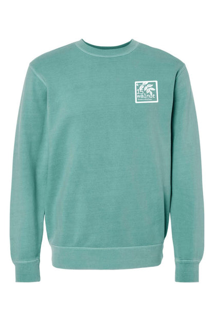 Pigment-dyed teal crewneck sweatshirt with a white 15 Walnut Tavern + Kitchen chest logo.