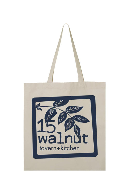 Natural canvas tote bag featuring a navy blue 15 Walnut Tavern + Kitchen logo with a leaf illustration.