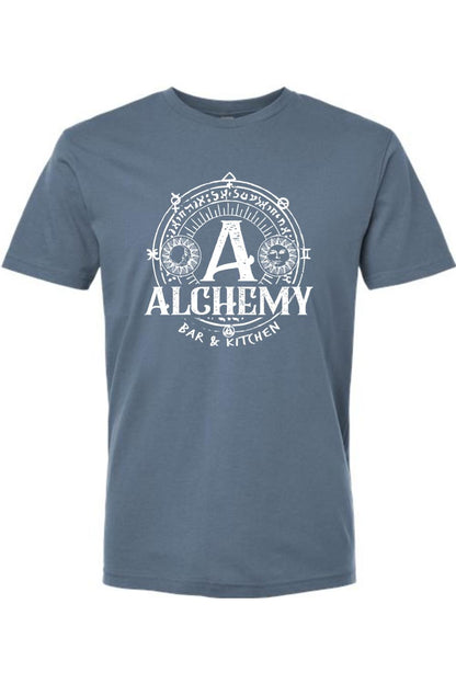 Blue crew neck t-shirt featuring a white Alchemy Bar & Kitchen circular graphic with sun and moon celestial symbols.