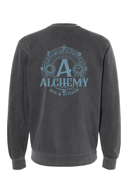 Charcoal pigment-dyed crewneck sweatshirt featuring a blue Alchemy Bar & Kitchen circular graphic on the back.