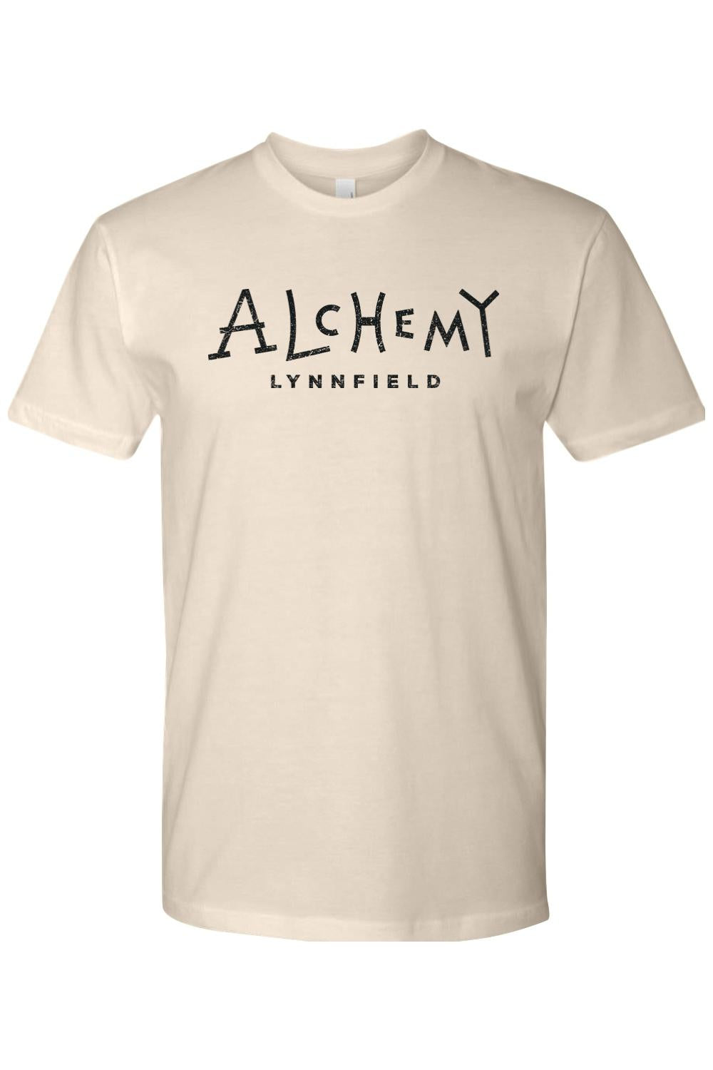 Cream-colored unisex short-sleeve crewneck t-shirt featuring Alchemy Lynnfield text in a distressed black font.