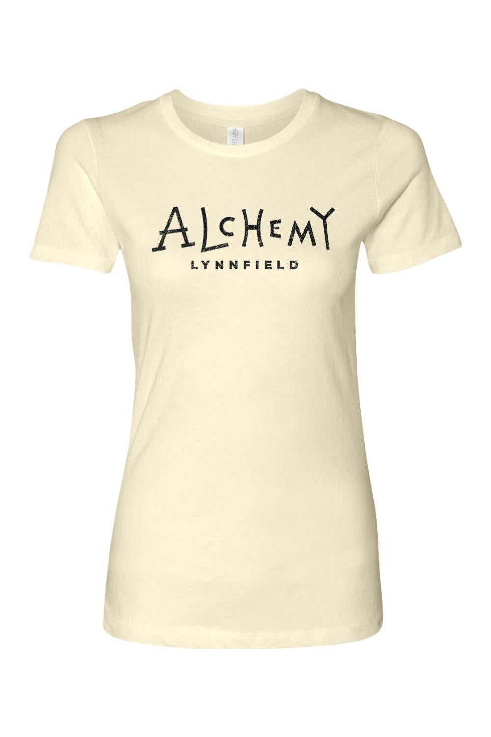 Cream-colored slim-fit women's t-shirt featuring a black Alchemy Lynnfield logo graphic on the chest.