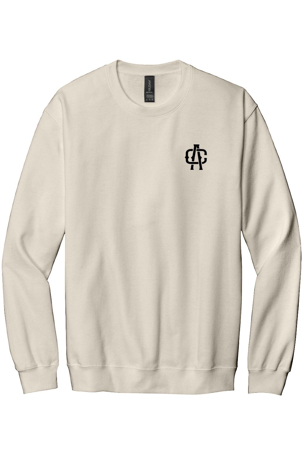 Cream-colored crewneck sweatshirt featuring a small black Alma Cantina AC logo on the left chest.