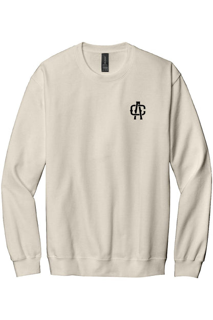 Cream-colored crewneck sweatshirt featuring a small black Alma Cantina AC logo on the left chest.