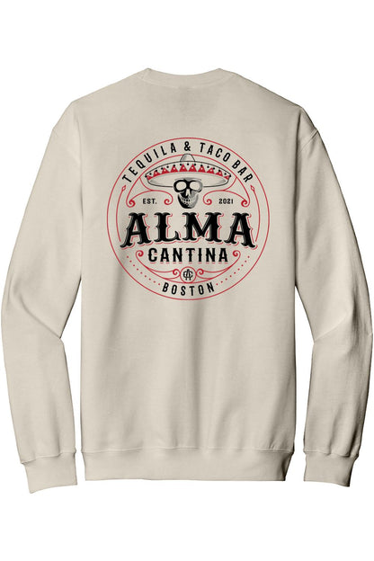 Beige crewneck sweatshirt featuring a red and black Alma Cantina logo with a skull and sombrero on the back.