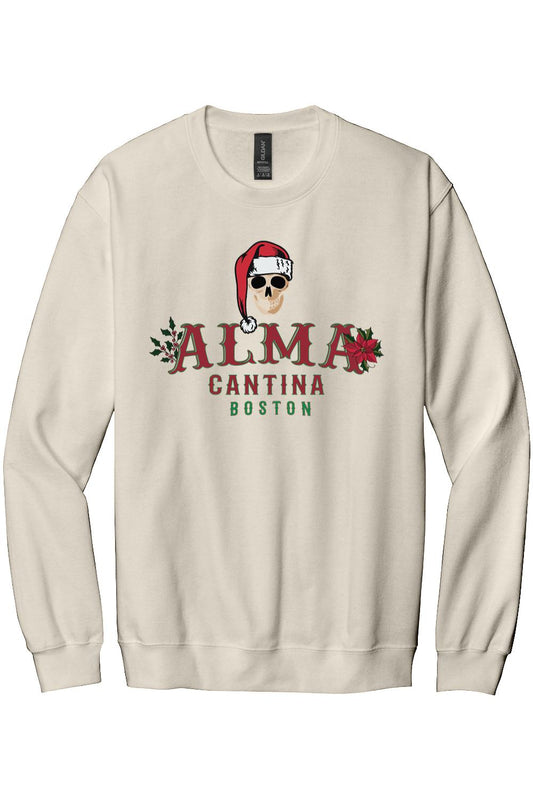 Cream-colored cotton crewneck sweatshirt featuring an Alma Cantina holiday skull graphic with a Santa hat and poinsettias.