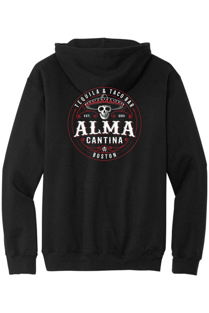 Black cotton zip-up hoodie featuring a red and white Alma Cantina skull logo graphic on the back.