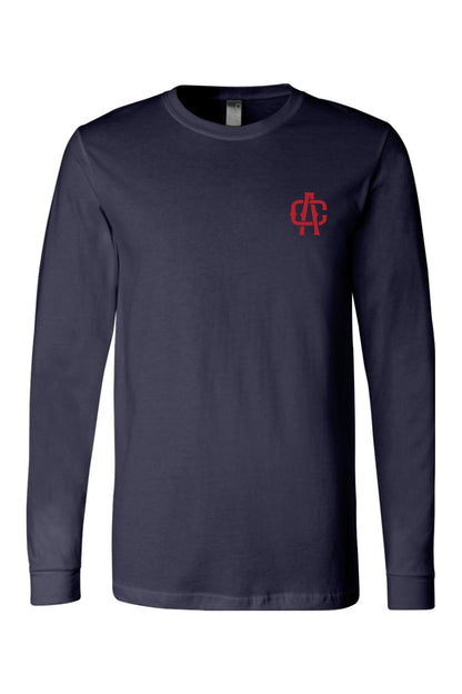 Navy blue long sleeve cotton t-shirt featuring a small red Alma Cantina logo on the left chest.