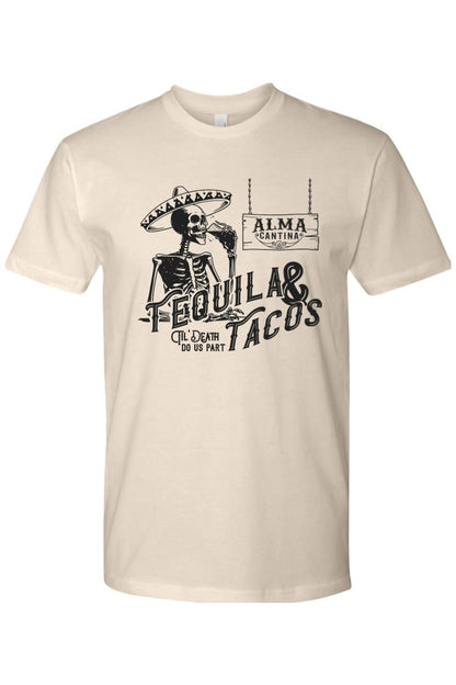 Cream-colored premium cotton t-shirt featuring a skeleton in a sombrero drinking tequila with Alma Cantina branding.