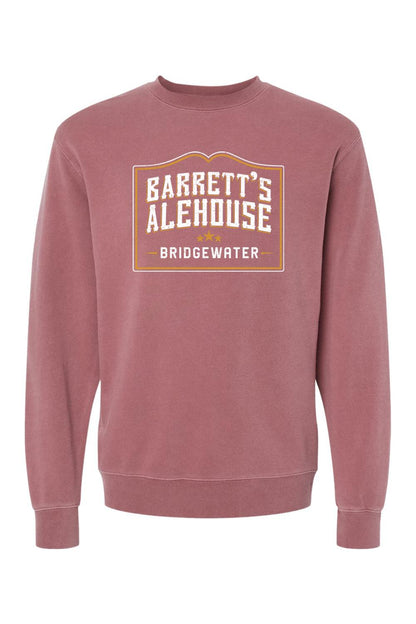 Dusty rose pigment-dyed crewneck sweatshirt featuring a white and gold Barrett's Alehouse Bridgewater logo graphic.