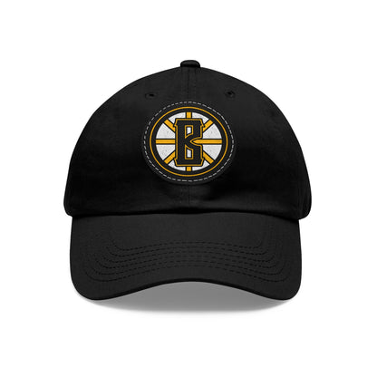 Black unstructured dad hat with a circular leather patch featuring a yellow and white Barrett's Alehouse logo.