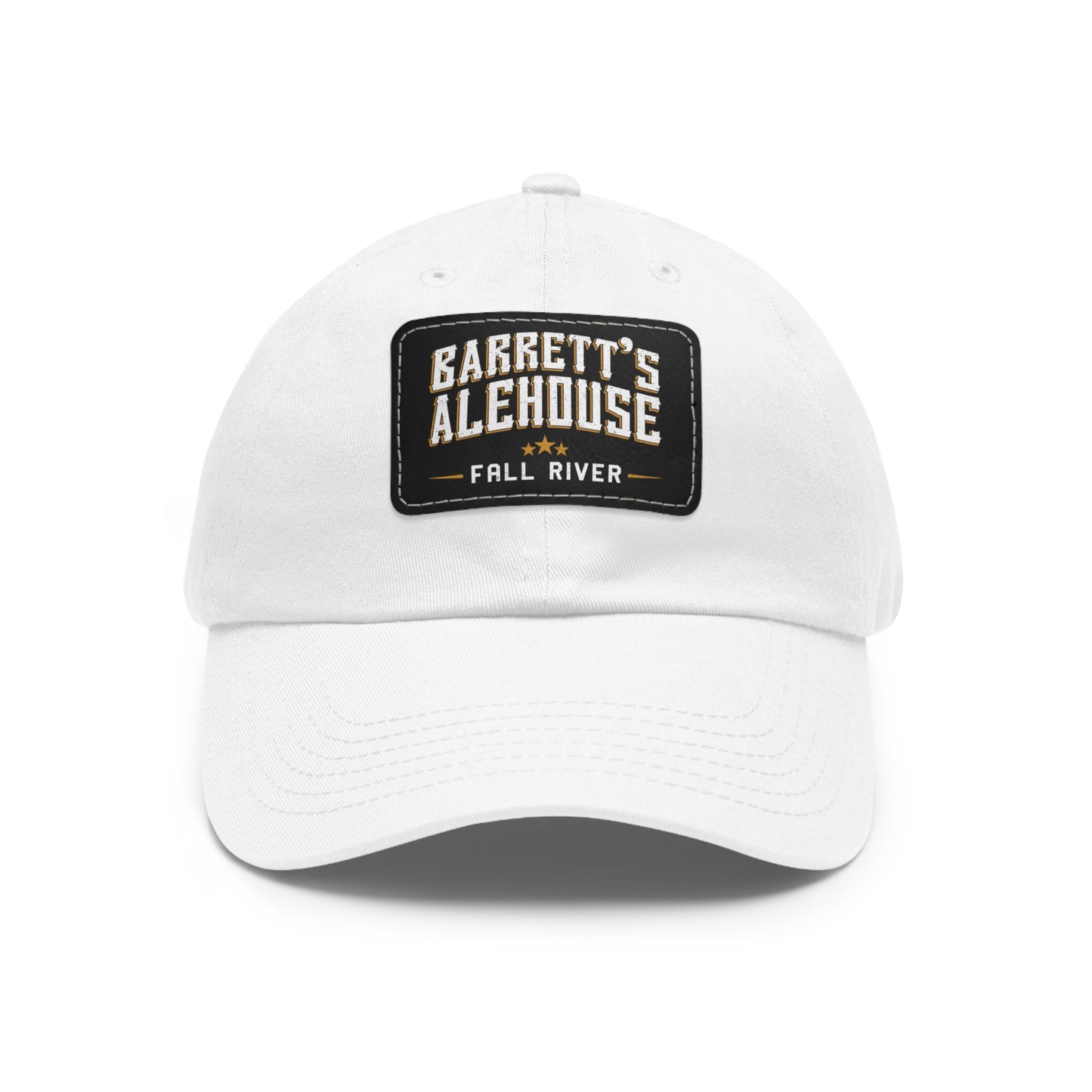 White unstructured dad hat with a black faux leather patch featuring the Barrett's Alehouse Fall River logo.