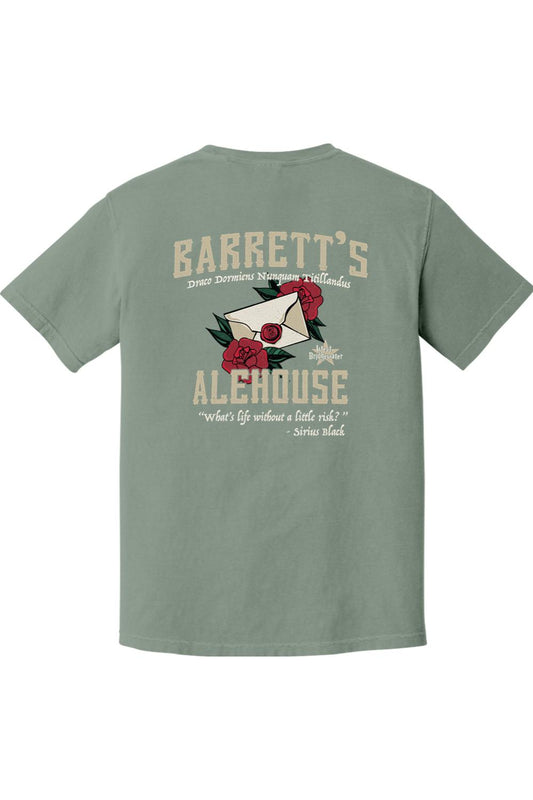 Sage green Comfort Colors cotton t-shirt featuring a Barrett's Alehouse rose and letter graphic on the back.