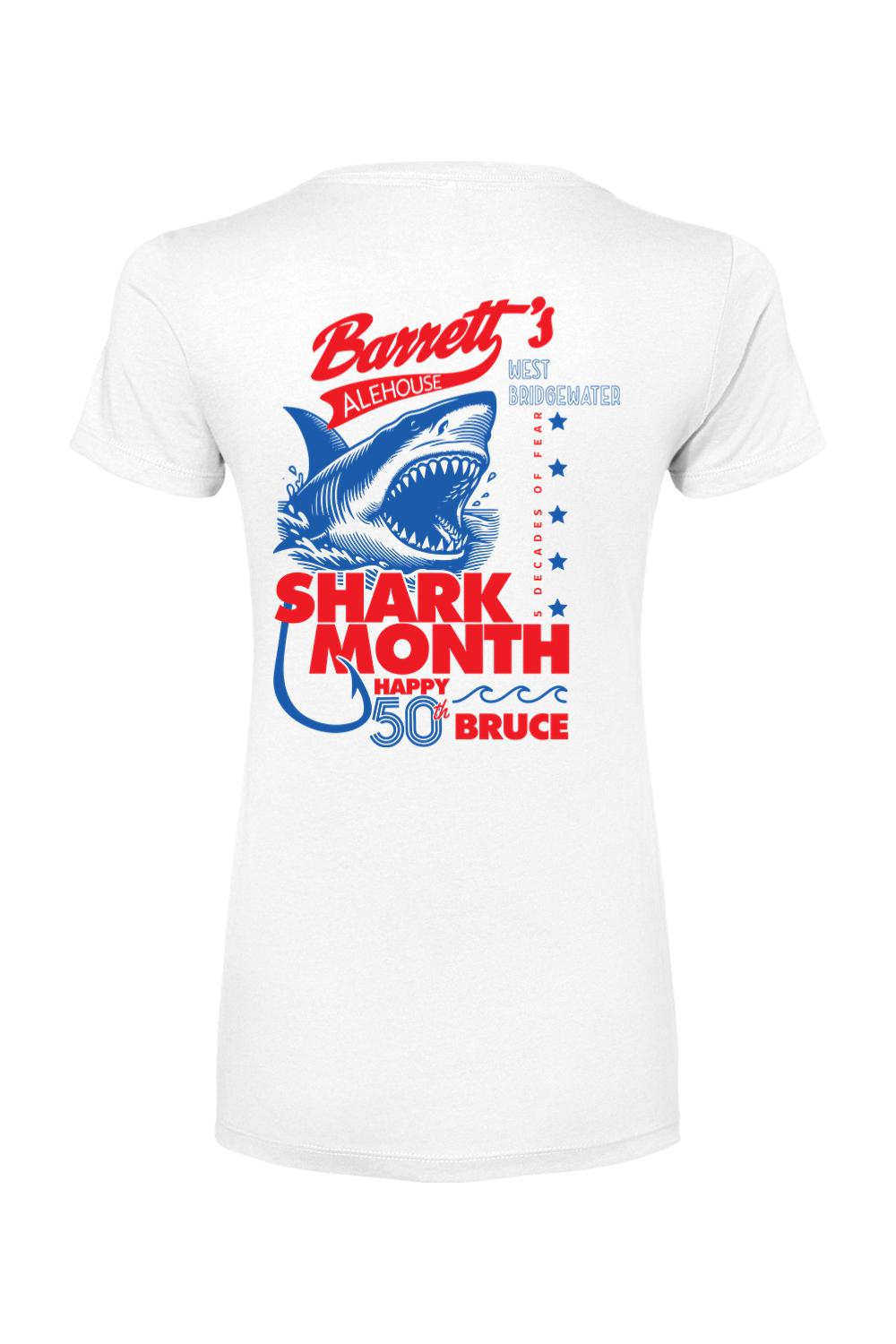 White women's cotton-blend t-shirt featuring a red and blue Shark Month 2025 graphic with a shark on the back.