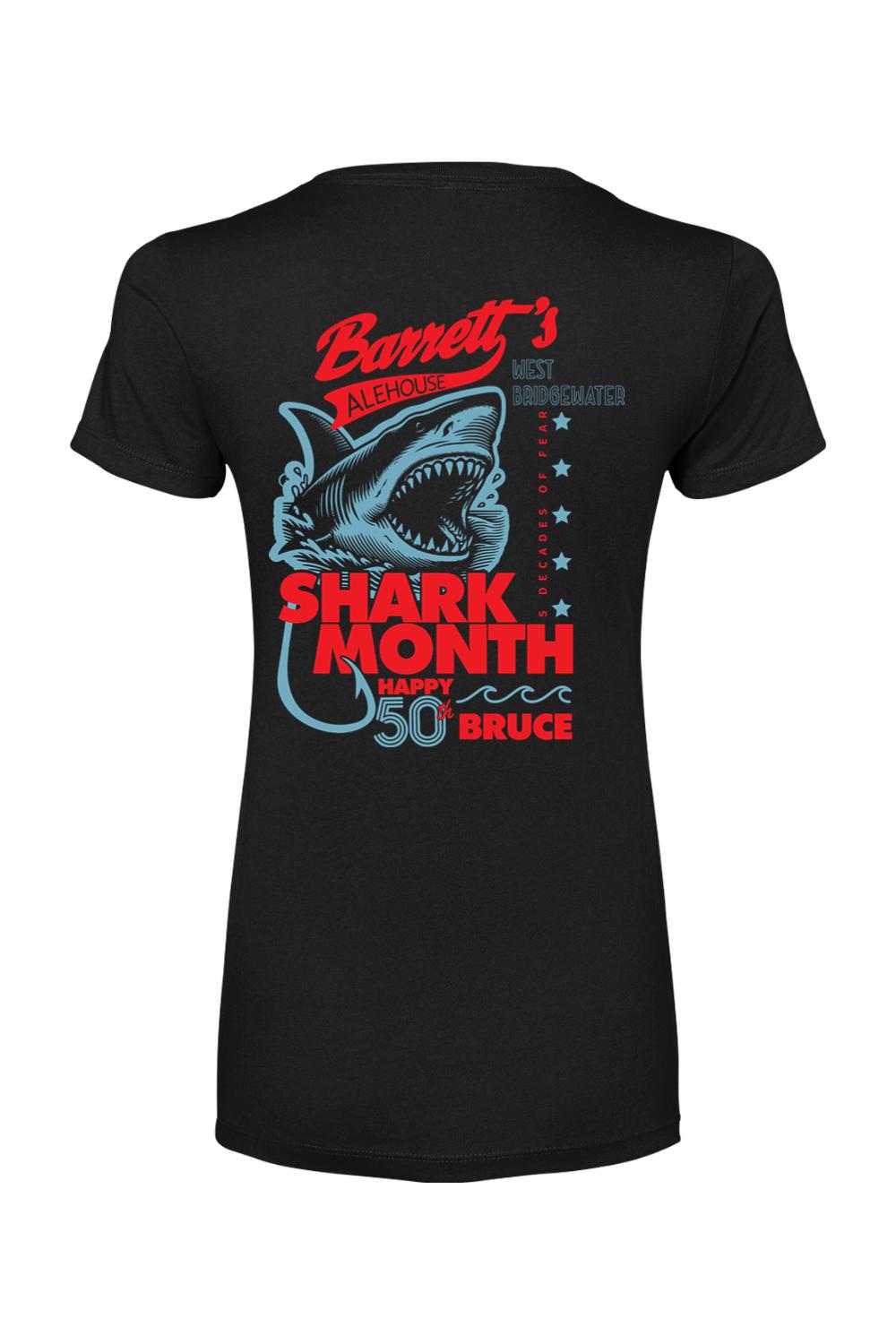 Black women's cotton-blend t-shirt featuring a red and blue Shark Month 2025 graphic with a shark illustration.