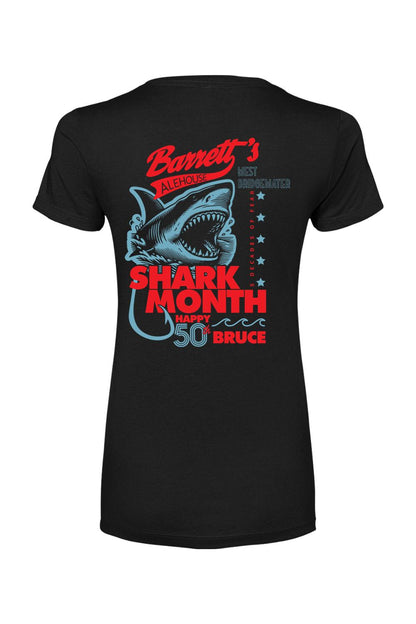 Black women's cotton-blend t-shirt featuring a red and blue Shark Month 2025 graphic with a shark illustration.