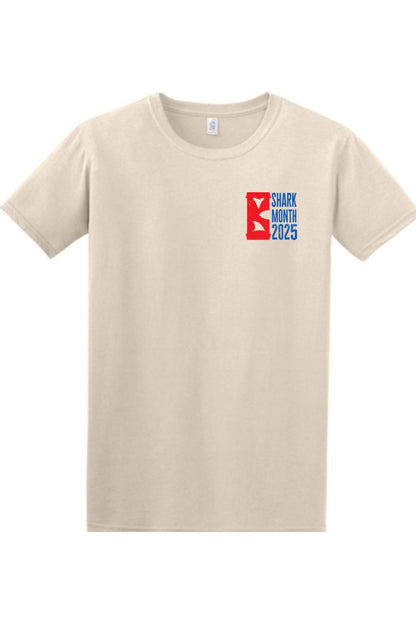 Beige 100% cotton crewneck t-shirt featuring a red and blue Shark Month 2025 logo on the left chest.