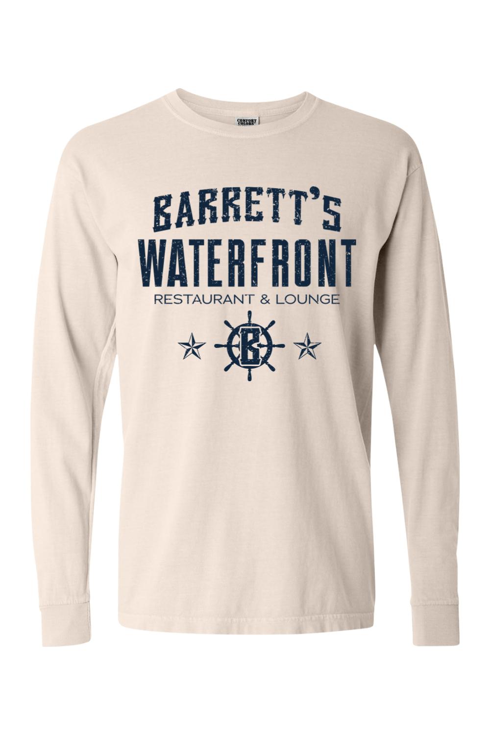 Beige Comfort Colors long sleeve t-shirt featuring a navy blue Barrett's Waterfront logo and nautical ship wheel graphic.