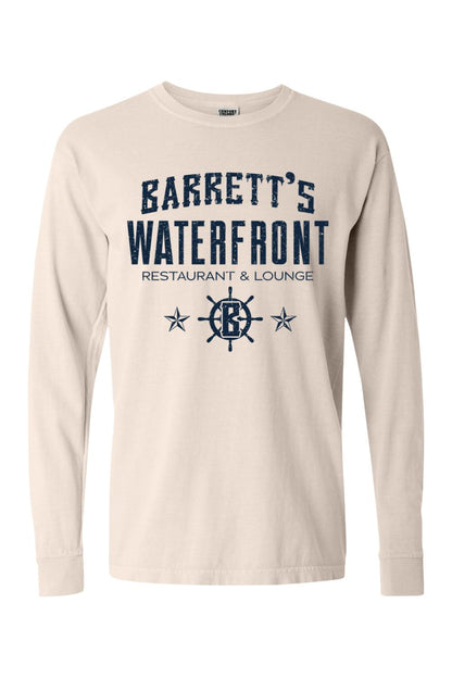 Beige Comfort Colors long sleeve t-shirt featuring a navy blue Barrett's Waterfront logo and nautical ship wheel graphic.