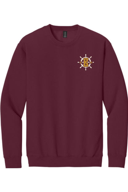 Maroon crewneck sweatshirt featuring a white ship wheel logo with a gold letter B on the left chest.