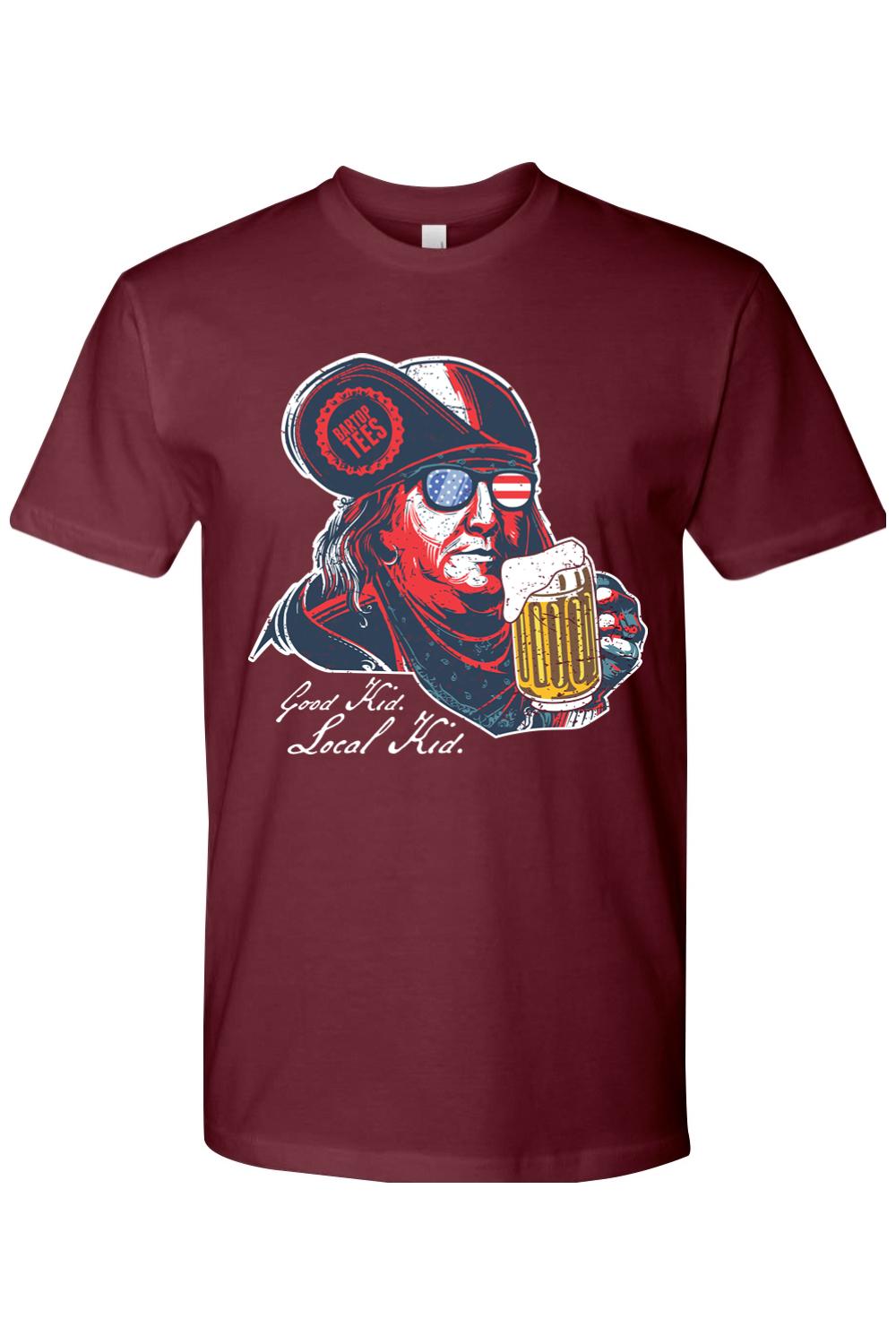 Maroon cotton crewneck tee featuring a graphic of Ben Franklin wearing flag sunglasses and holding a beer mug.