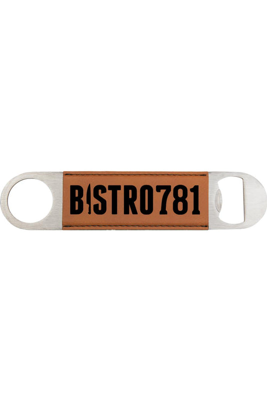 Tan leatherette bottle opener with Bistro 781 engraved in black on a stainless steel frame.