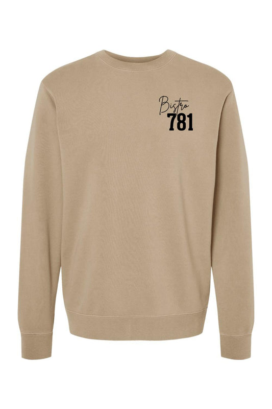 Tan pigment-dyed crewneck sweatshirt with black Bistro 781 logo on the chest, made from a soft cotton-blend fabric.