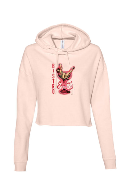 Light pink cropped hooded sweatshirt featuring a vintage pin-up graphic inside a martini glass design.