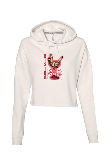 White cropped hooded sweatshirt featuring a vintage pin-up girl graphic inside a red espresso martini glass.