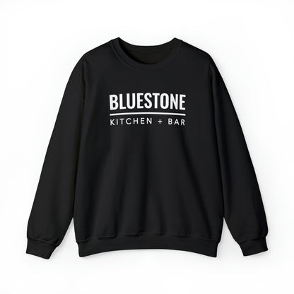 Black heavy blend crewneck sweatshirt featuring white Bluestone Kitchen + Bar text branding on the chest.