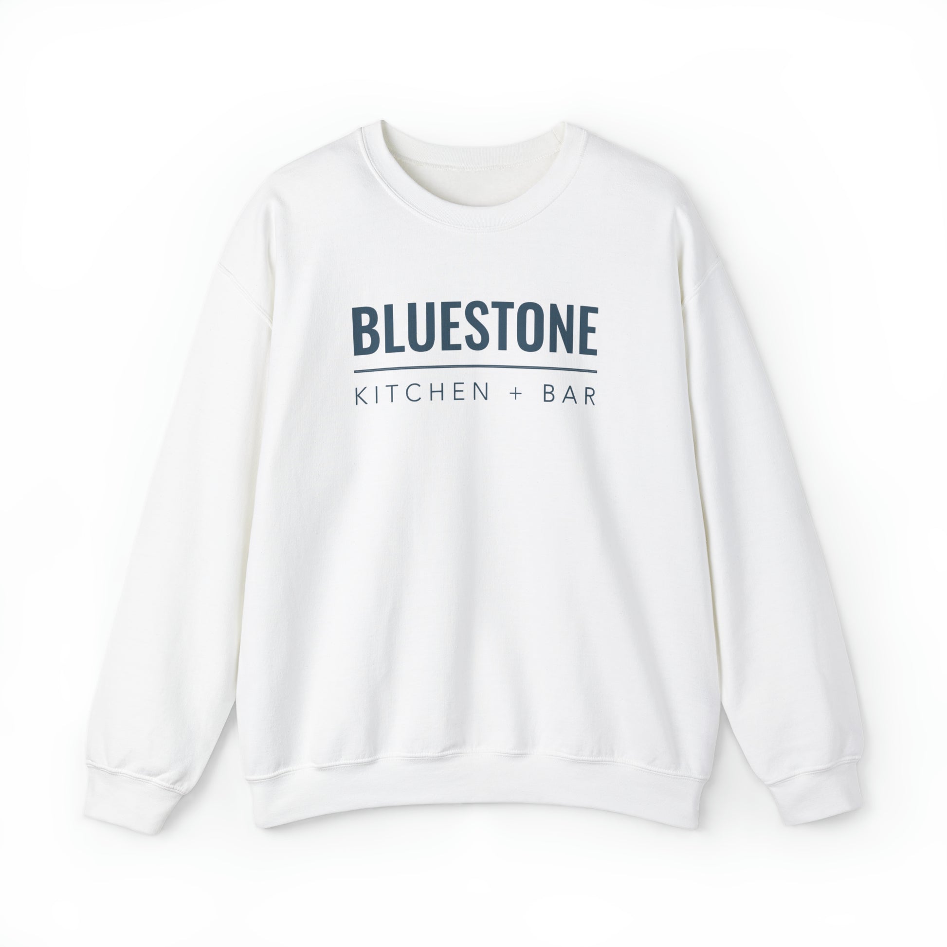 White crewneck sweatshirt with a loose fit, featuring Bluestone Kitchen + Bar text in dark blue on the chest.