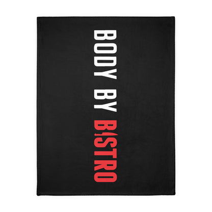 Soft black velveteen minky blanket with vertical white and red Body by Bistro text and a stitched edge.